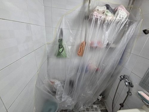 누수탐지 보수 후 건조 기간을 거쳐 복구된 욕실 천장의 모습